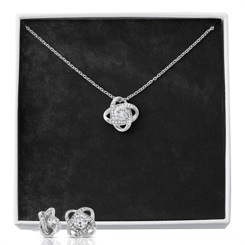 Ensemble boucles d'oreilles et collier nœud d'amour
